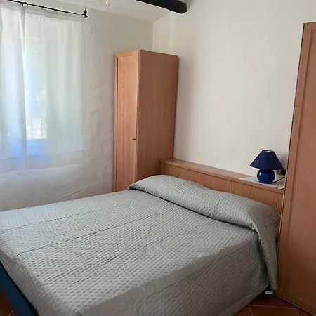 Casa A Capriccioli Con Giardino Apartment